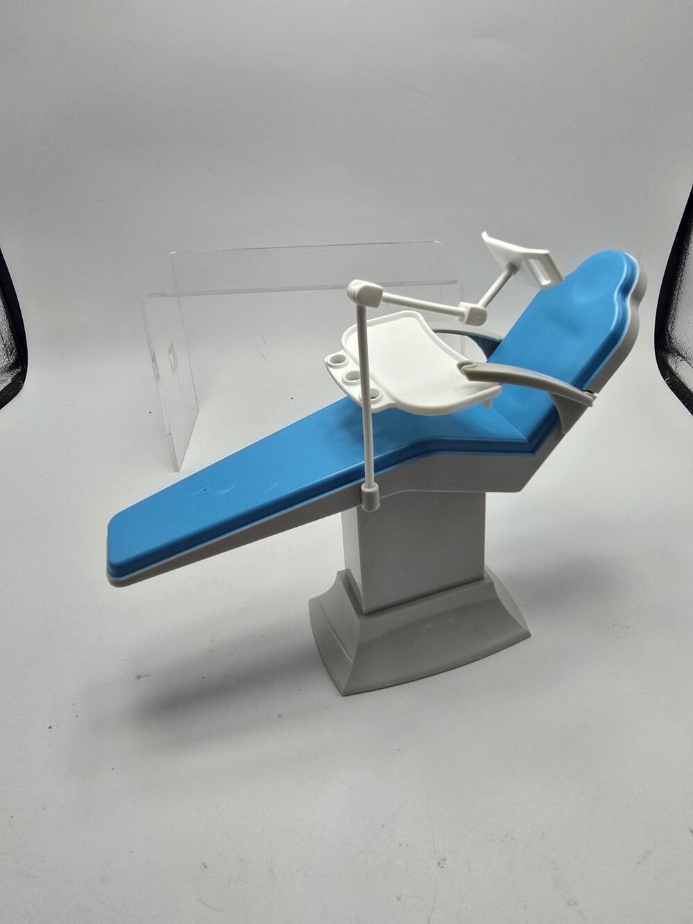 Barbie 1996 dentist chair with tray blue seat, gray stand and white tray.
